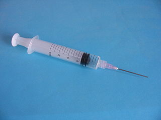 Picture of a syringe with scale in milliliters
